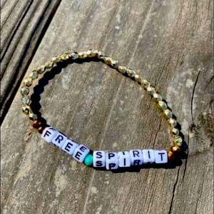 Gold free spirit bracelet